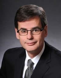 Serge P. Dupont, Commissioner